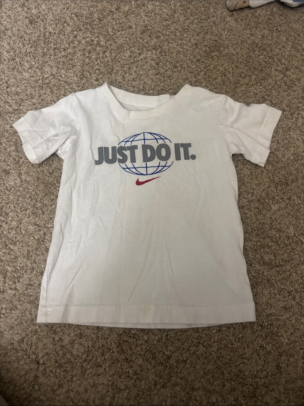 Nike White Kids 'Just Do It' Graphic Tee with Blue Globe